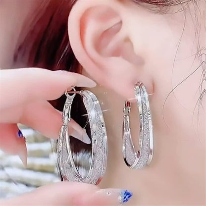 Zircon encrusted Hoops