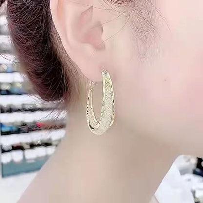 Zircon encrusted Hoops